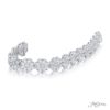 Pear shaped and round diamond bracelet floral design