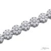 Pear shaped and round diamond bracelet floral design