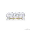 Elegance Elevated: Classic Single-Row Diamond Band | Oval-Cut Diamonds Set in Shared Prongs Handcrafted in Platinum & 18K Yellow Gold