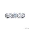 Elegance Elevated: Classic Single-Row Round-Cut Diamond Band in Platinum