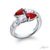 Breathtaking Radiance: Twogether Ruby Ring Pear-Shaped Rubies & Oval Diamonds in Pure Platinum